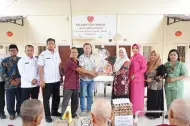 Ketua TP PKK Asahan Ny. Yusnila Indriati Taufik Hadir di Bhakti Sosial, Berbagi Kasih dengan Anak Yatim dan Lansia