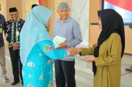 Tuntaskan Penantian 16 Tahun, Bupati Afni Serahkan Puluhan SHM Warga Balai Kayang