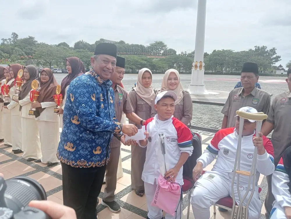 Tatap Peparnas 2028, Bupati Rohul Anton Gelontorkan Bantuan Alat Olahraga Atlet Difabel NPCI
