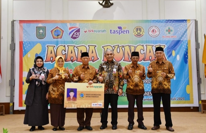HUT ke-61, PWRI Riau Terima Kado KTA e-Money BRK Syariah