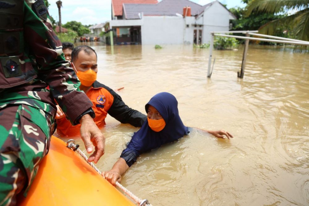 Curah Hujan Tinggi, BPBD Riau Ingatkan Masyarakat Waspada Banjir