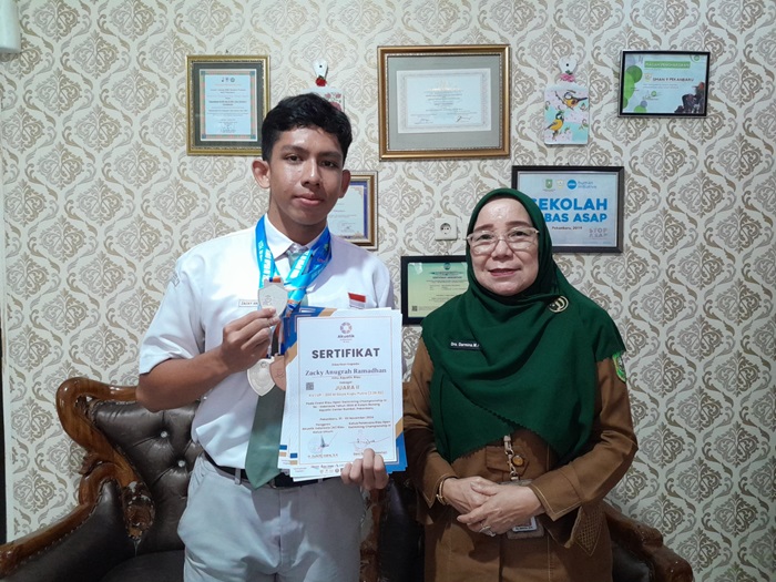 Zaky Anugerah Borong 3 Medali di Open Swimming Championship 2024