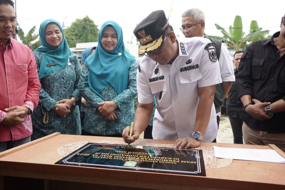 Pj Gubri Resmikan SPAM Sungai Salak Inhil, Baru 13 Rumah Terdistribusi