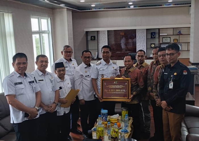 Konsisten Terapkan Efisiensi, KPU Rohil Kembalikan Dana Hibah Pilkada Rp 6,51 Miliar